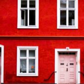 pink wooden double doors are closed